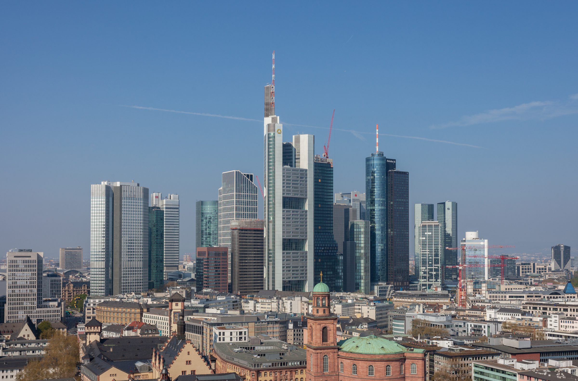The Frankfurt skyline against a blue sky, seen from the cathedral